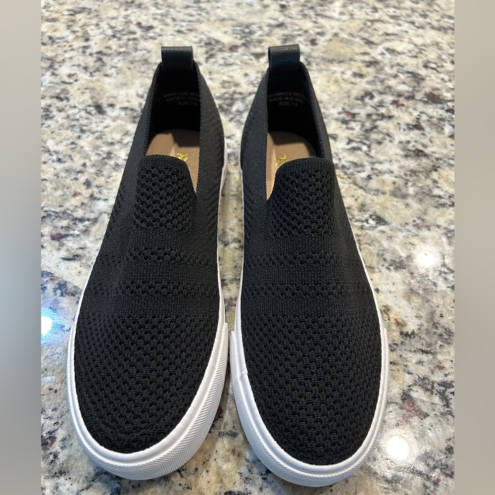 Women’s black slip on shoes. Never worn. Size 7.5